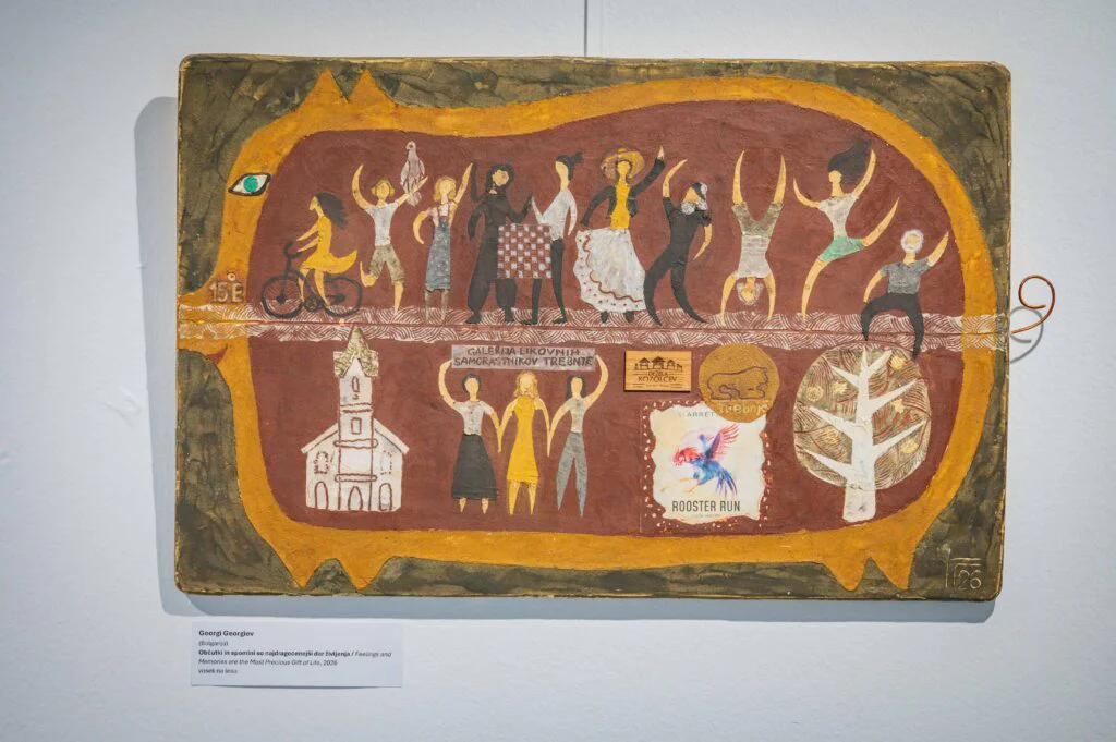 The winning artwork by Georgi Georgiev from Bulgaria is shaped like a pig; inside the pig, at the top, are the people who participated in the camp, and at the bottom are memories of it.